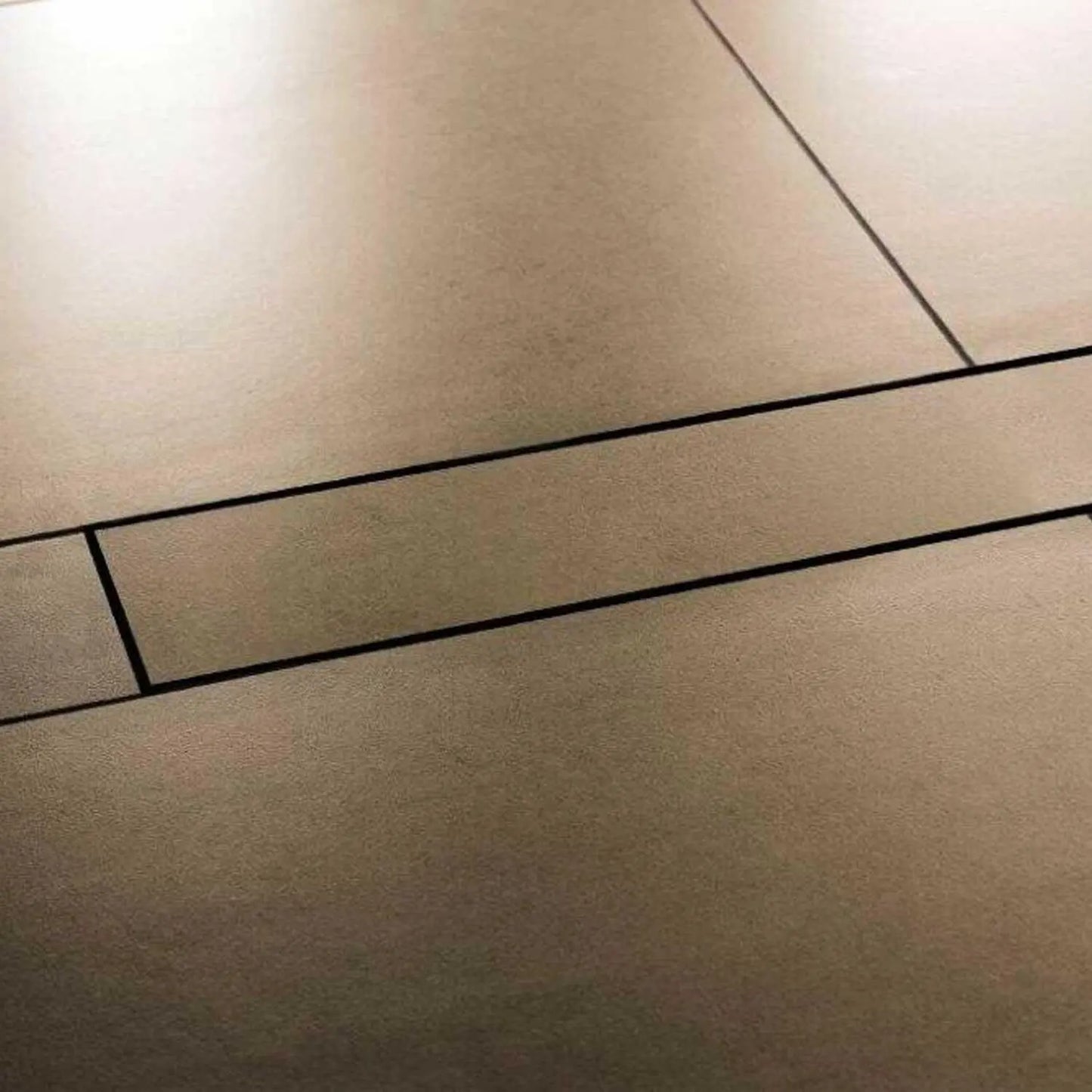 Schluter®-KERDI-LINE offset frameless tillable grate